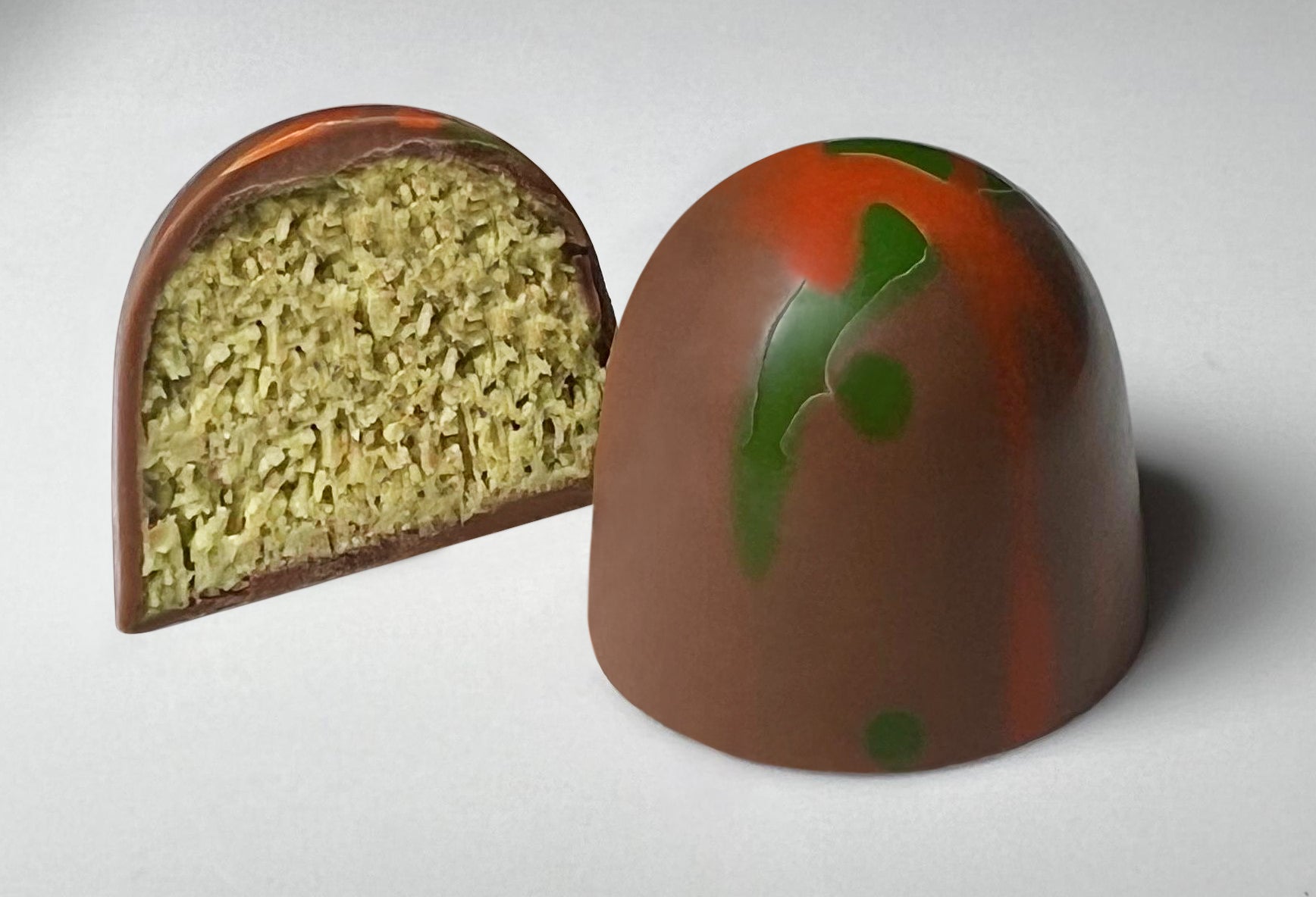 Famous Dubai chocolate in Chocolate Bonbons, Milk chocolate with Kunafa. Also know as Pistachio chocolate or Kunafeh Chocolate