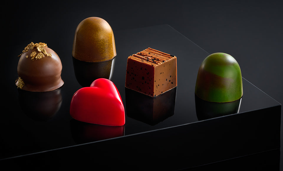 Hiqh quality chocolate products, milk chocolate, dark chocolate, pistachio chocolate, heart shape chocolate