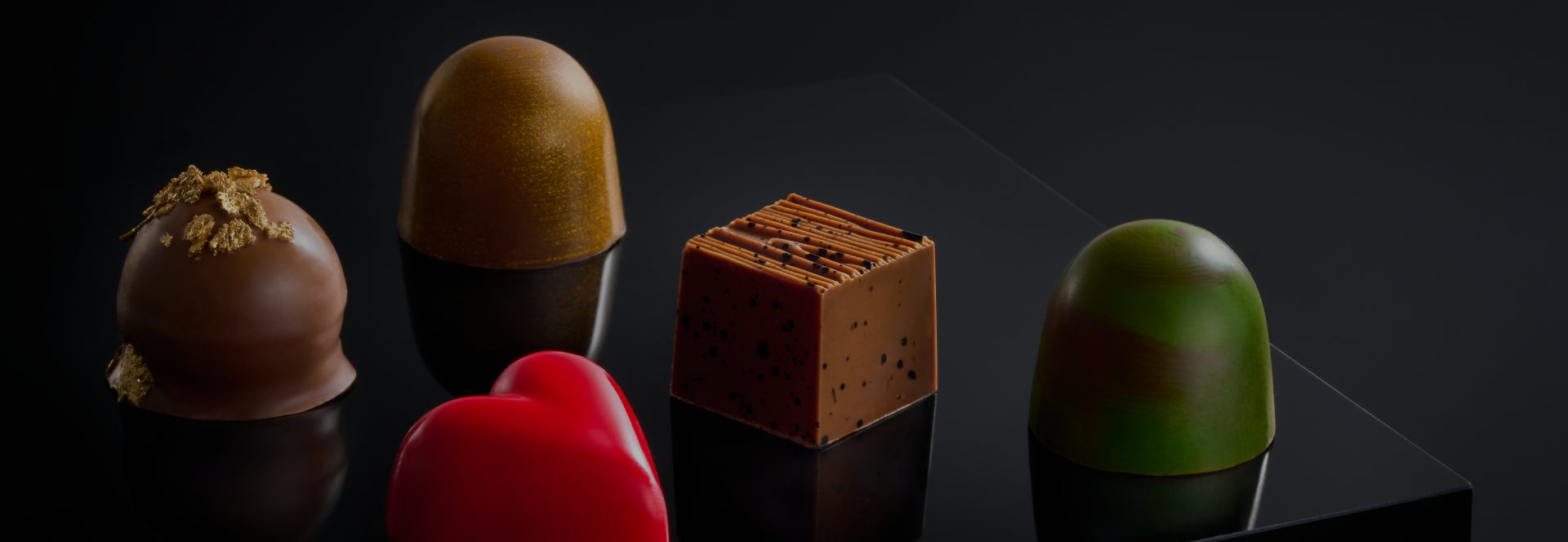 LES BONBONS Chocolate bonbons, milk chocolate, dark chocolate, assorted chocolate, creative shot, high quality belgian chocolate, close up